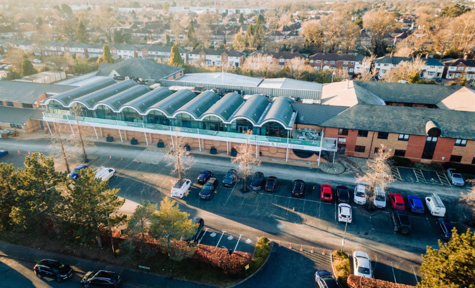 a birds eye view of Cranmore Park, a conference and exhibition venue with neighbouring buildings