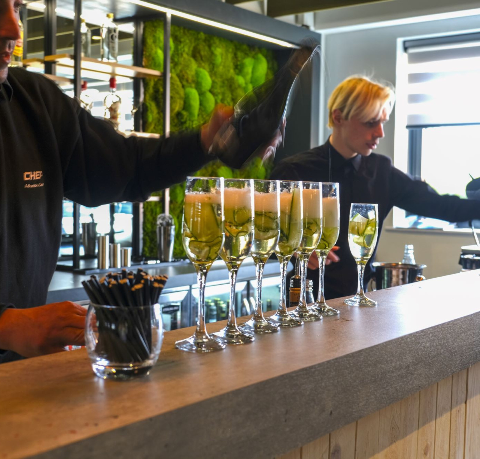 bar staff serving drinks at the loft bar
