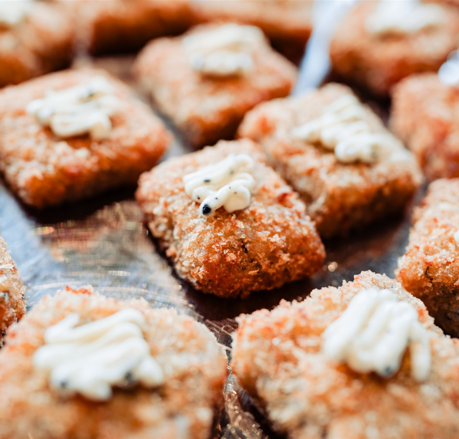 canapes on wooden board