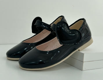 Glossy navy blue ballet flats with a heart-shaped design on the strap. The shoes have a smooth finish and are displayed against a white background.