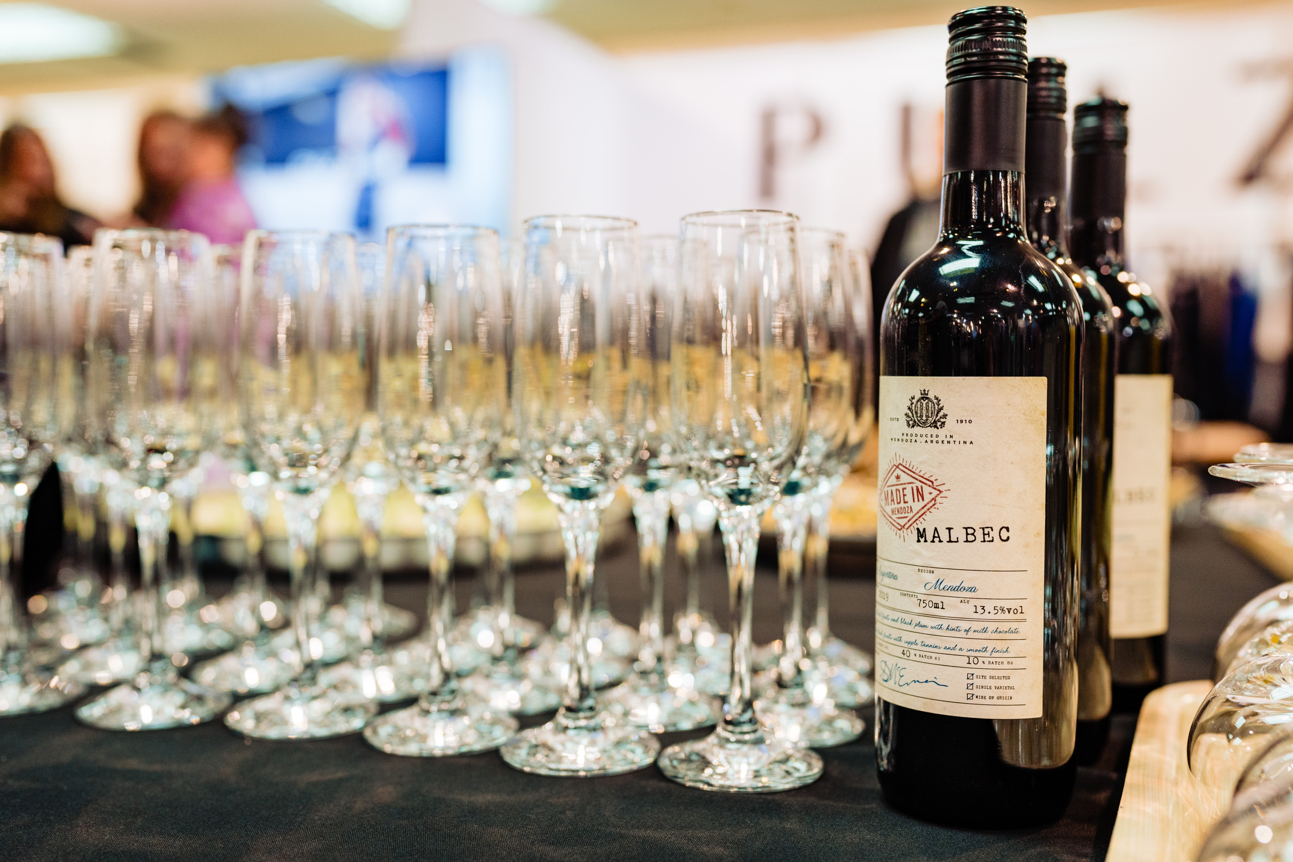 close up picture of wine bottles on show at cranmore park
