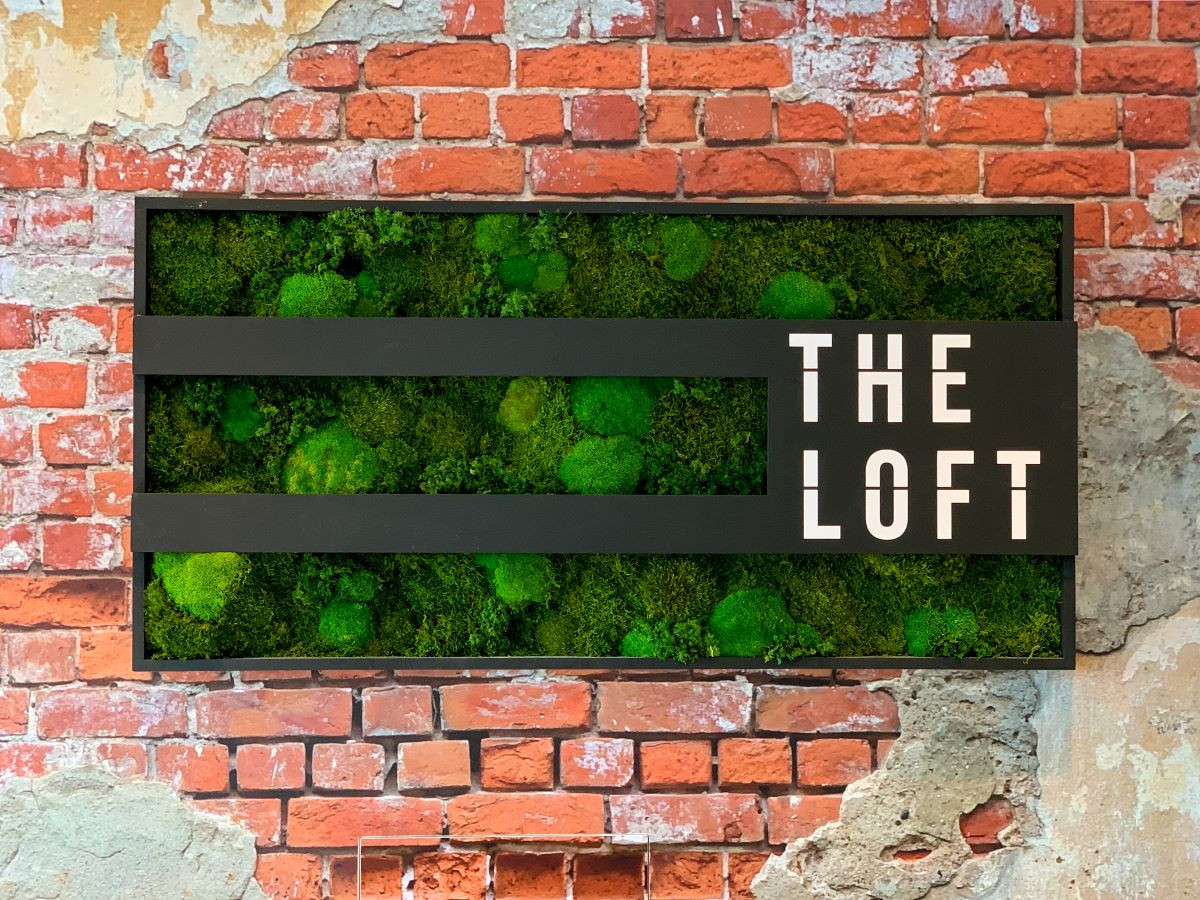 A framed wall display featuring the text 