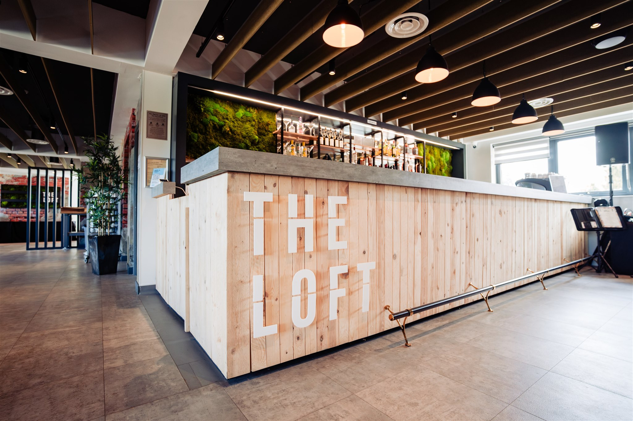 wooden bar stretching across room